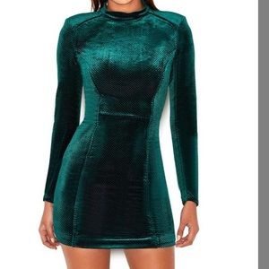 Emerald green velvet dress